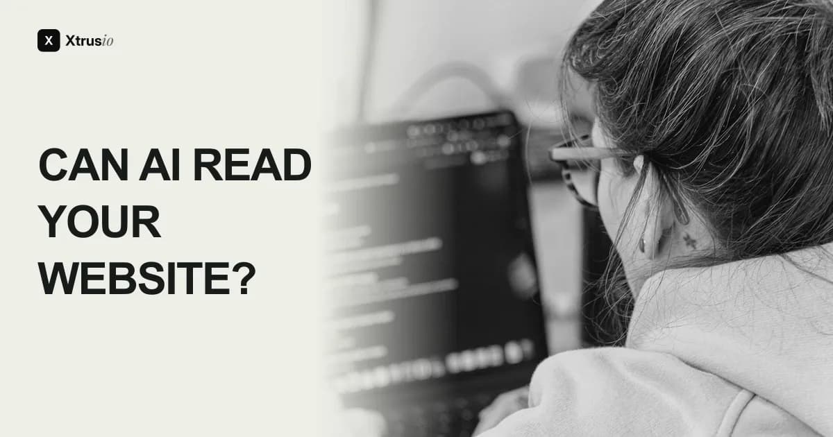 Can AI read your website? A person in glasses inspects code on a laptop.