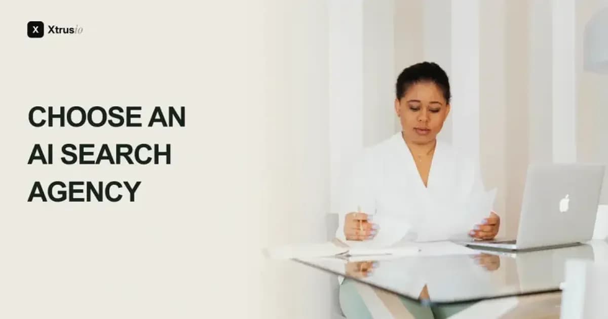 Choose an AI search agency: a woman reviewing documents beside a laptop