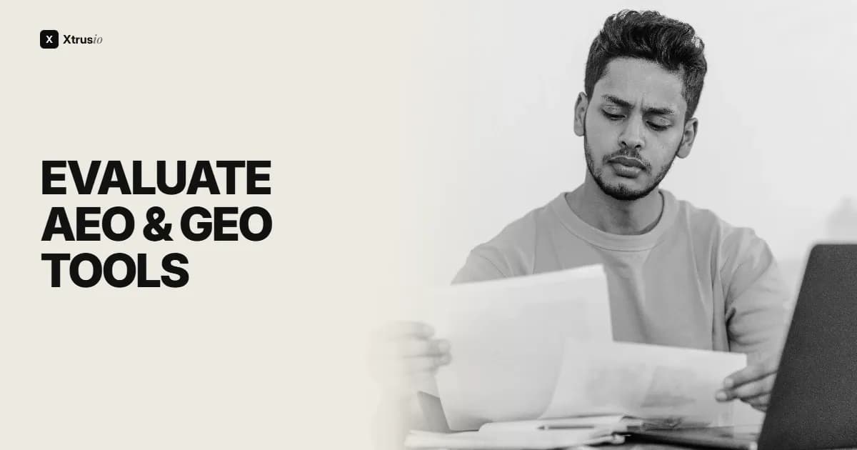 Professional comparing documents beside a laptop with the title Evaluate AEO and GEO Tools