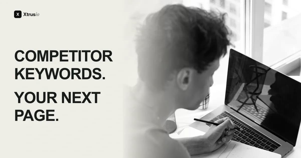 Competitor keywords, your next page. A person reviews notes beside a laptop.
